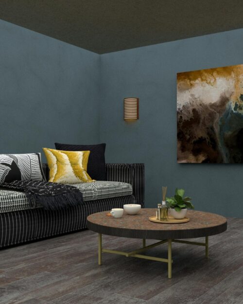 Elegant living room featuring a contemporary sofa, center table, and abstract wall art in a modern setting.