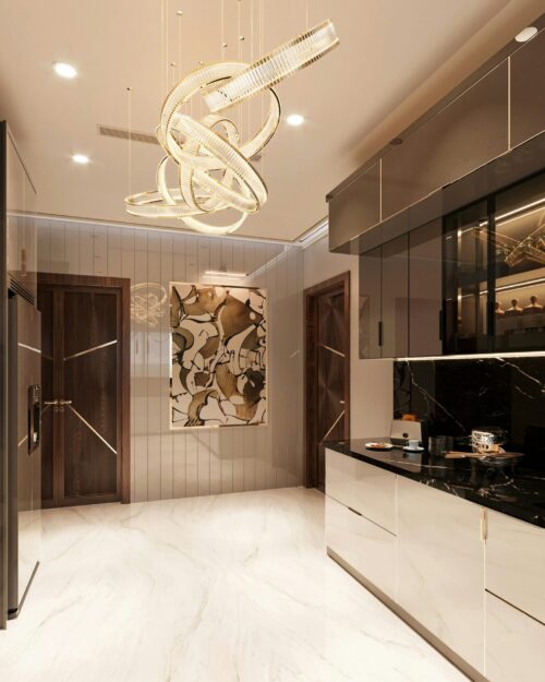 Spacious contemporary kitchen design featuring sleek cabinets and a unique decorative chandelier.